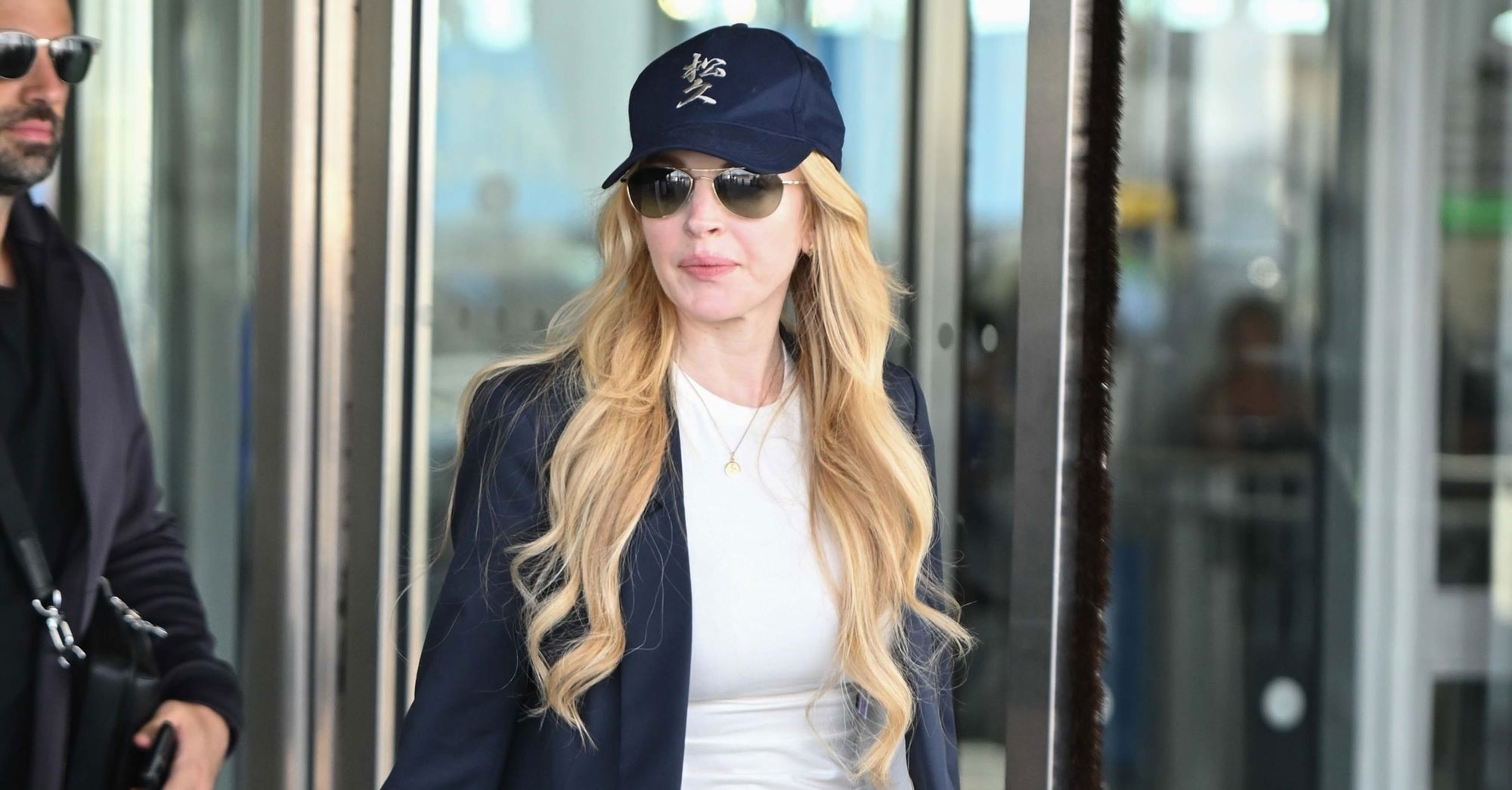 Don't Wear Leggings to the Airport Without Seeing Lindsay Lohan's Much Chicer Alternative
