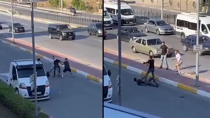They clashed in the middle of traffic! Hammers and sticks flew in the air