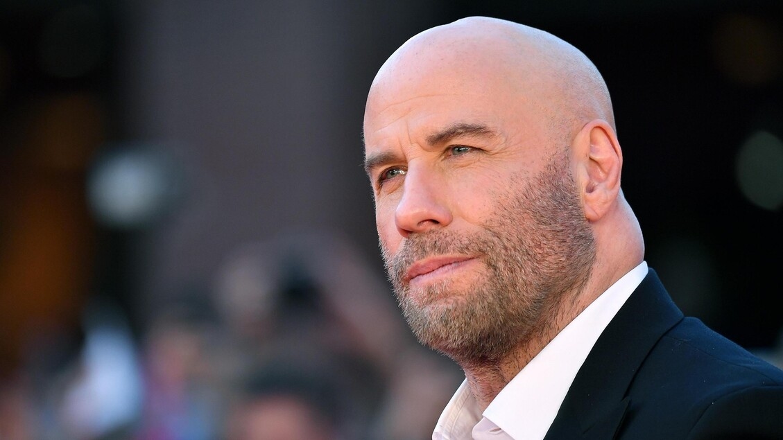 John Travolta de vacaciones en Chile, visto con uno de sus hijos.