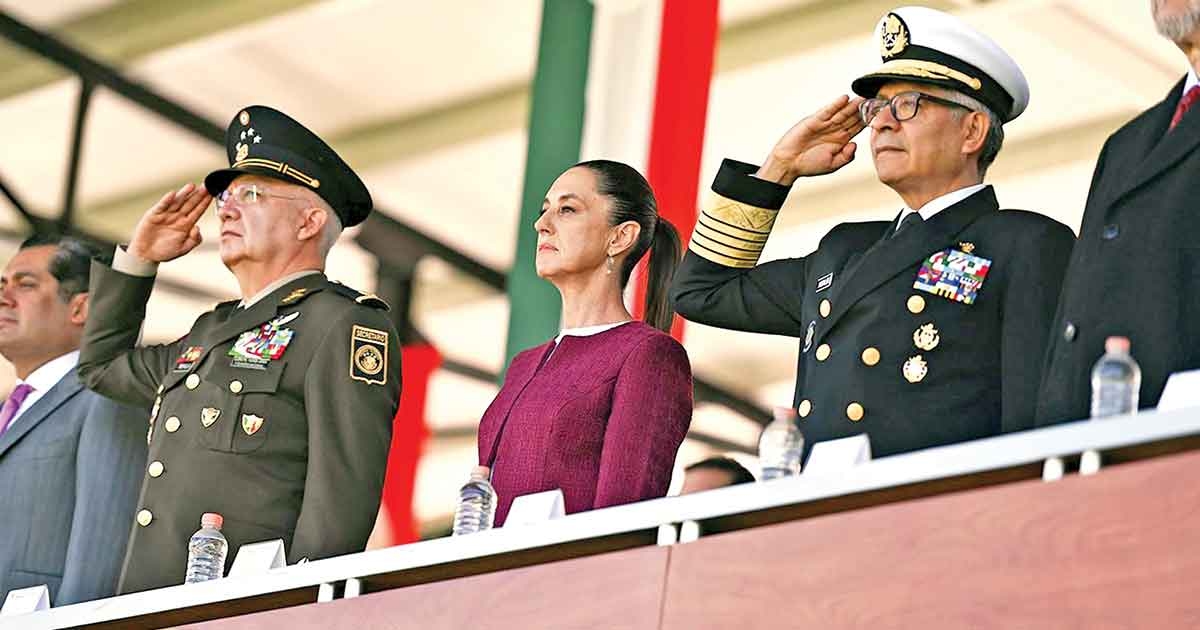 Admiral Raymundo Pedro Morales celebrates the flag