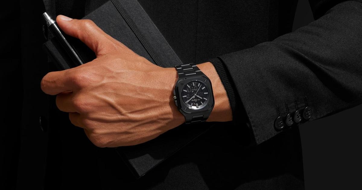 Black watches emerge from the shadows